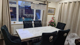 White Arial Dining Table with Black Majestic Chairs