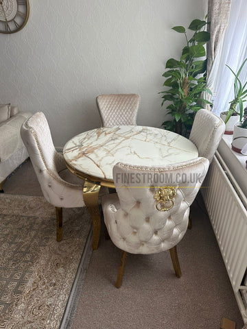 Kata Gold Louis Round Dining Table With Victoria Cream Gold Lion Knocker Chairs